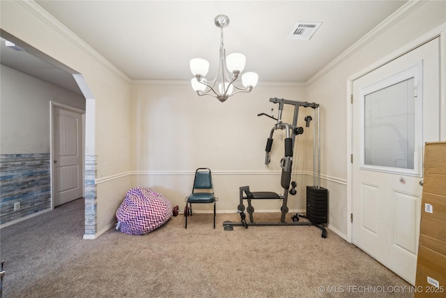 workout area featuring arched walkways, ornamental molding, carpet flooring, and a chandelier