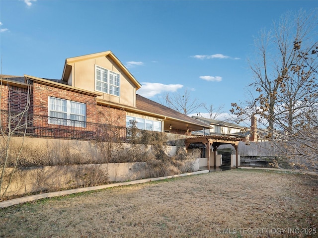 view of home's exterior featuring a pergola