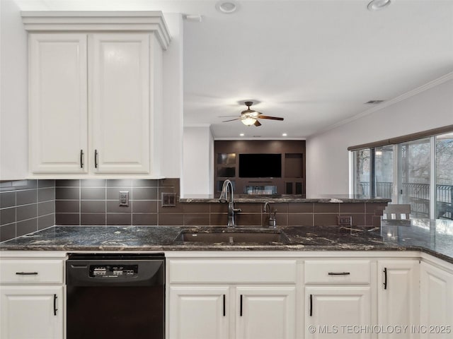 kitchen with dishwasher, white cabinets, dark stone counters, and sink