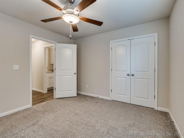 unfurnished bedroom featuring ceiling fan, carpet, and a closet