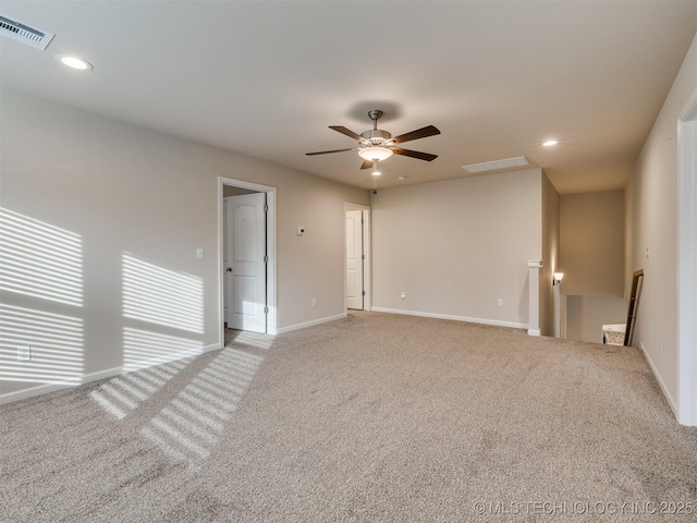 empty room with light carpet and ceiling fan