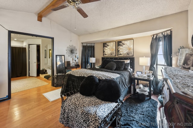 bedroom featuring hardwood / wood-style flooring, vaulted ceiling with beams, a textured ceiling, and ceiling fan