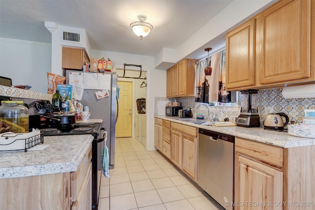 kitchen with light tile patterned floors, backsplash, electric range, stainless steel dishwasher, and sink