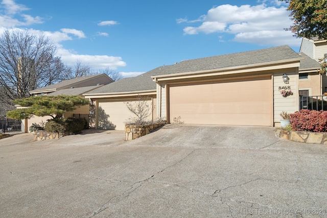 single story home with a garage