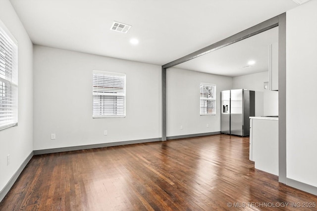 interior space with dark hardwood / wood-style floors