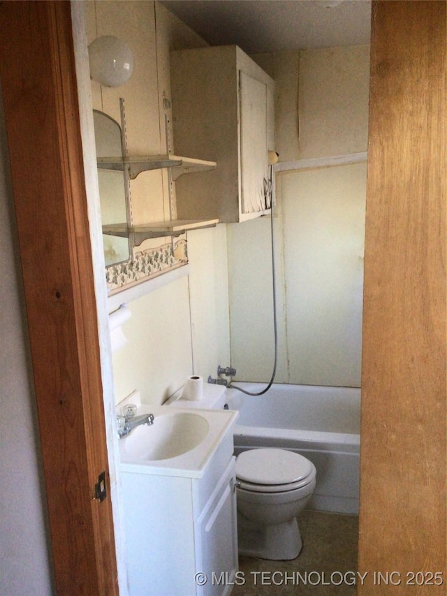 full bathroom featuring toilet, vanity, and tub / shower combination