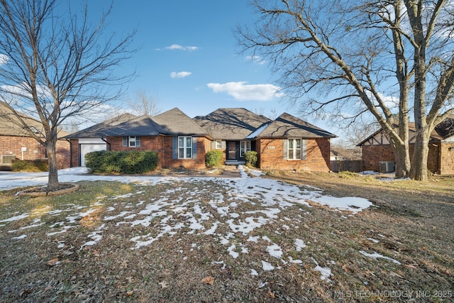 ranch-style house with central AC unit