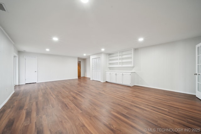 basement with dark wood-type flooring