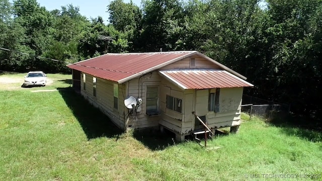 exterior space with a lawn