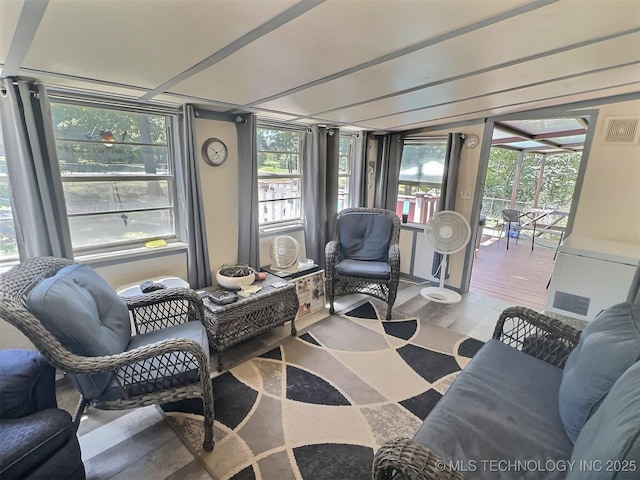 sunroom / solarium featuring a wealth of natural light