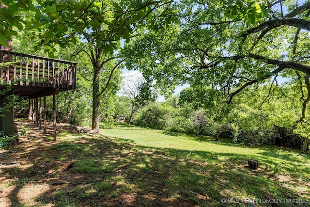 view of yard with a deck