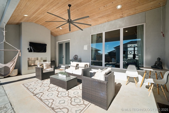 view of patio / terrace featuring french doors, a ceiling fan, and an outdoor hangout area
