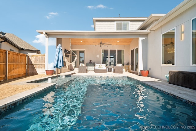 rear view of property featuring ceiling fan, a fenced in pool, an outdoor living space, a patio area, and fence private yard