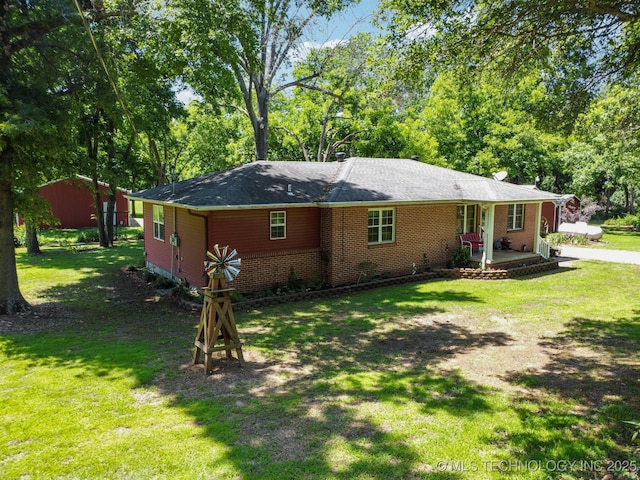 exterior space with a yard