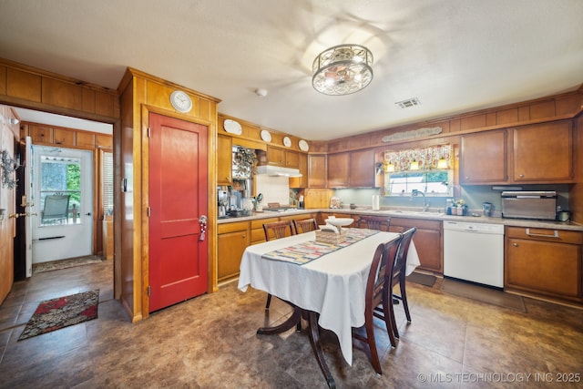 kitchen featuring sink, stainless steel gas stovetop, and dishwasher