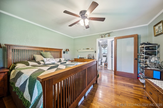 bedroom with ceiling fan, wood-type flooring, and ornamental molding