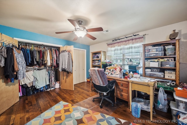 office space with ceiling fan and dark hardwood / wood-style flooring