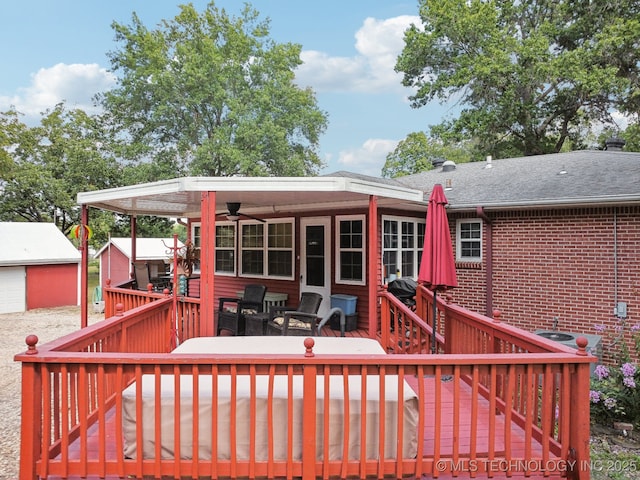 wooden deck with ceiling fan