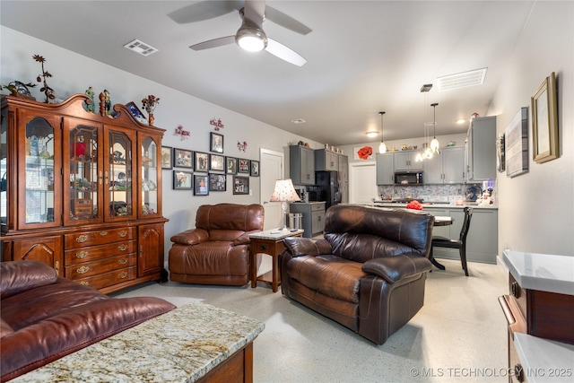 living room with ceiling fan