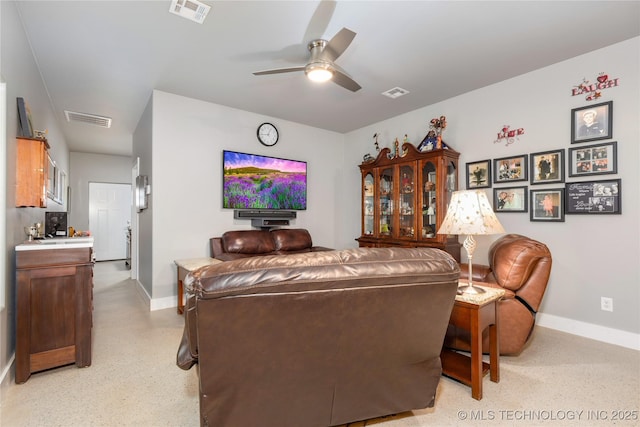 living room featuring ceiling fan