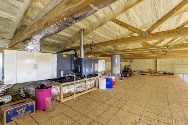 misc room with lofted ceiling and gas water heater