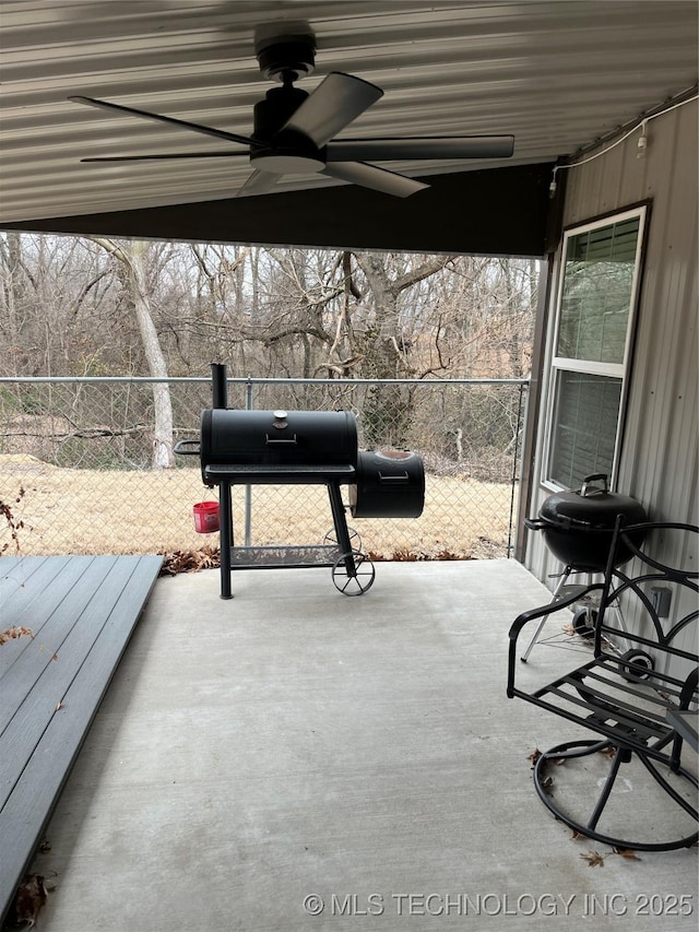 view of patio featuring ceiling fan