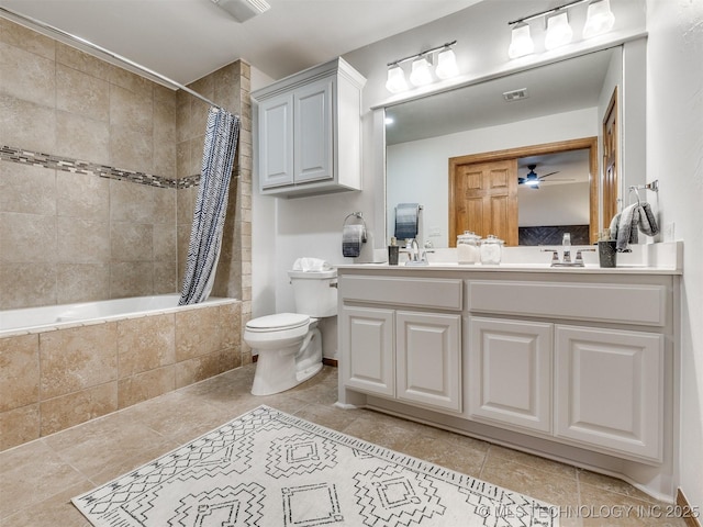 full bathroom featuring shower / bath combo with shower curtain, toilet, and vanity