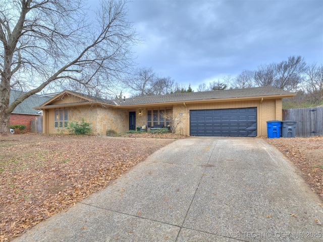 single story home featuring a garage