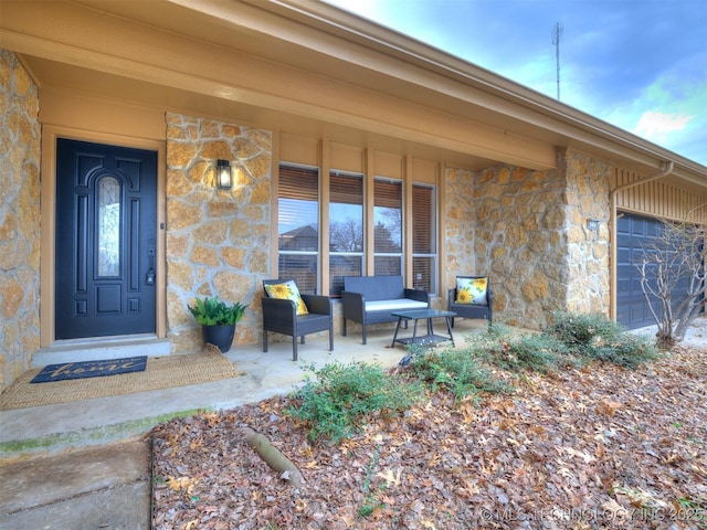 entrance to property featuring a garage