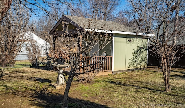 view of outdoor structure featuring a yard