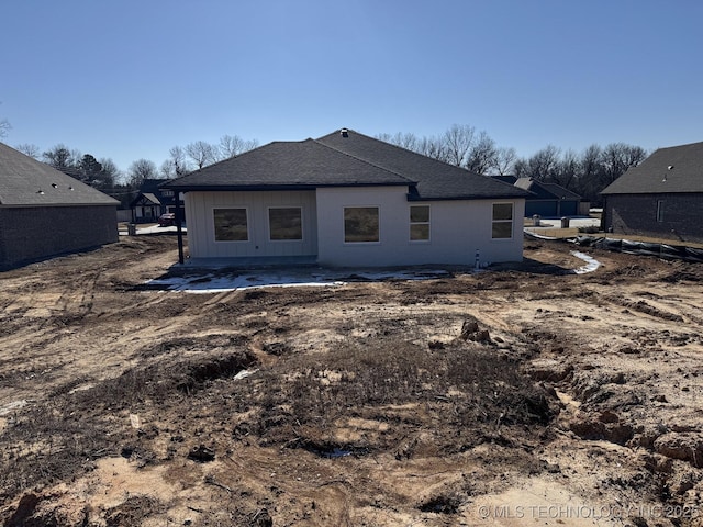 back of house with a patio area