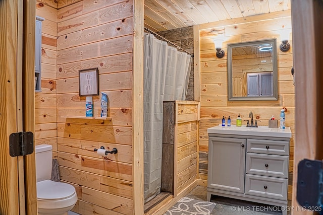 bathroom with toilet, wood ceiling, a shower with shower curtain, vanity, and wood walls