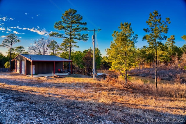 view of yard with a garage