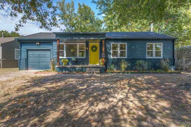 single story home featuring a garage and covered porch