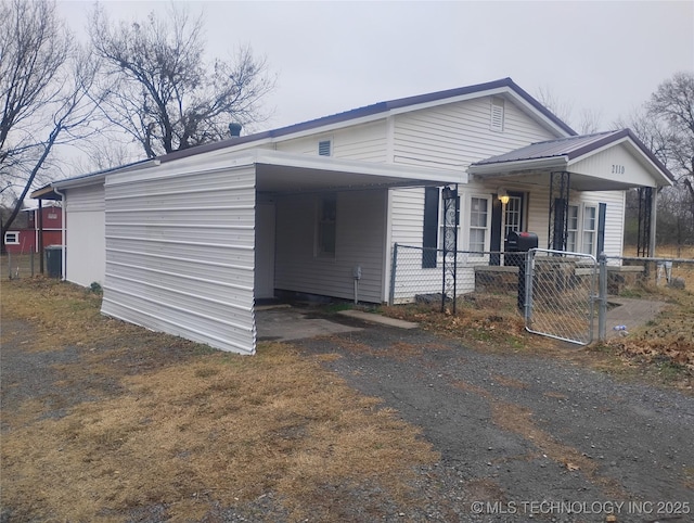 view of front of property with a carport