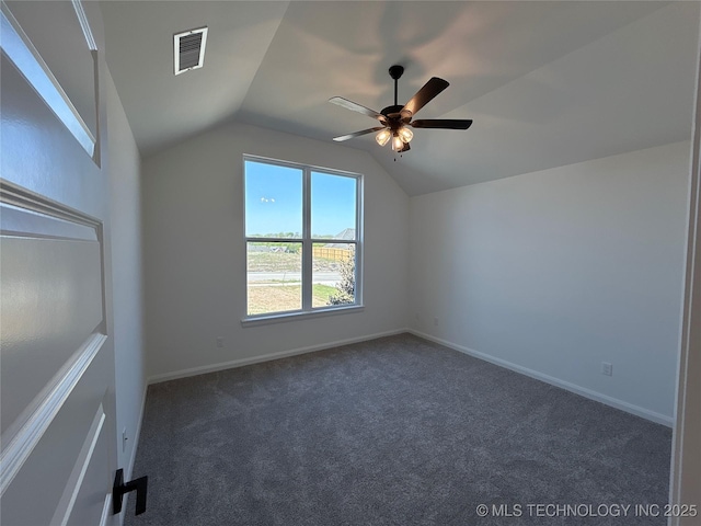 additional living space featuring a ceiling fan, vaulted ceiling, visible vents, carpet flooring, and baseboards