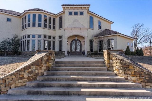 view of front of property featuring french doors