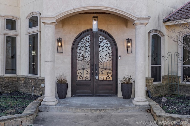 property entrance with french doors