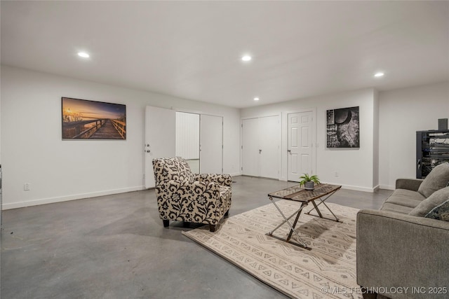 living room with concrete flooring