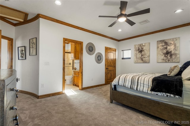 bedroom featuring ceiling fan, ensuite bathroom, light colored carpet, and crown molding