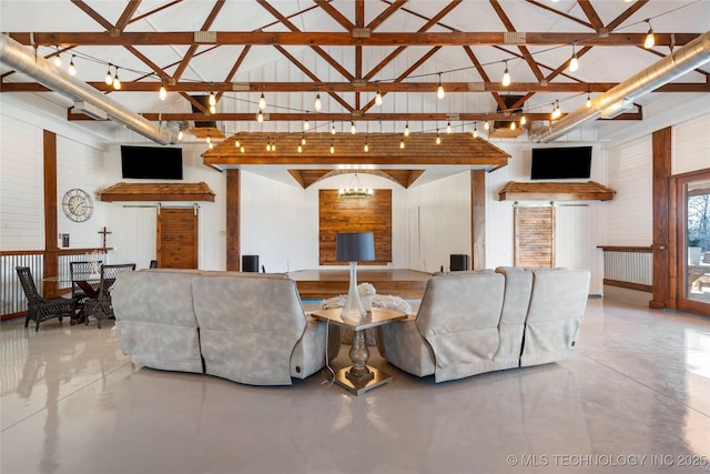 living room featuring a notable chandelier, high vaulted ceiling, and beam ceiling