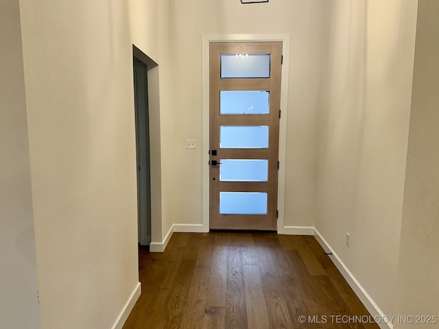 doorway to outside with dark hardwood / wood-style flooring