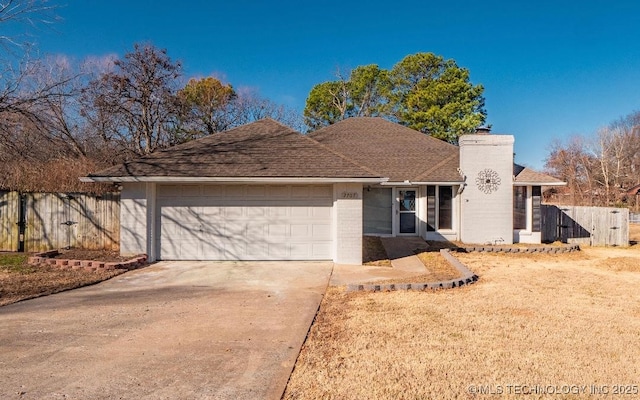 single story home featuring a garage