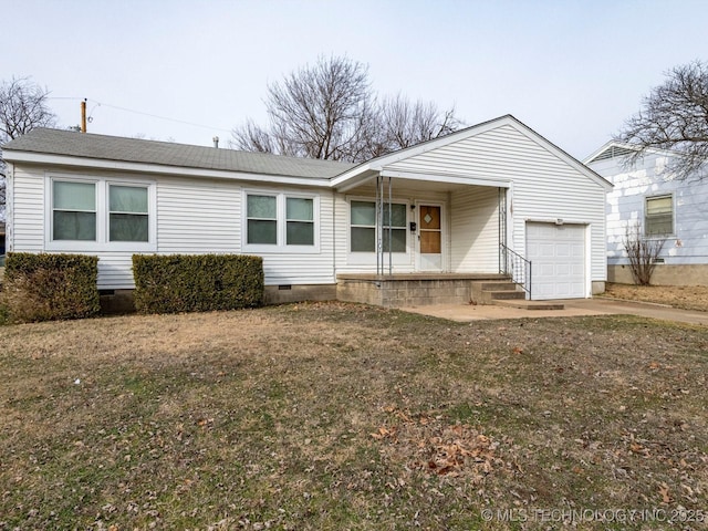 view of front of house featuring a garage, a front lawn, and a porch