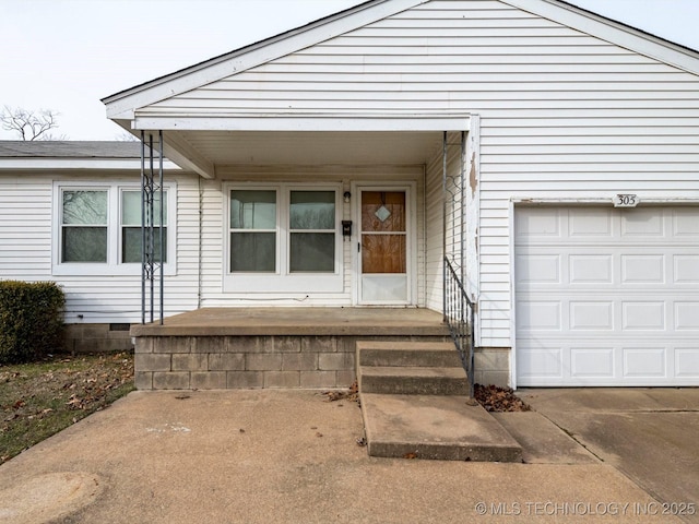 property entrance featuring a garage