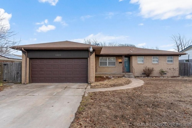 single story home featuring a garage