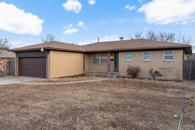 ranch-style house featuring a garage