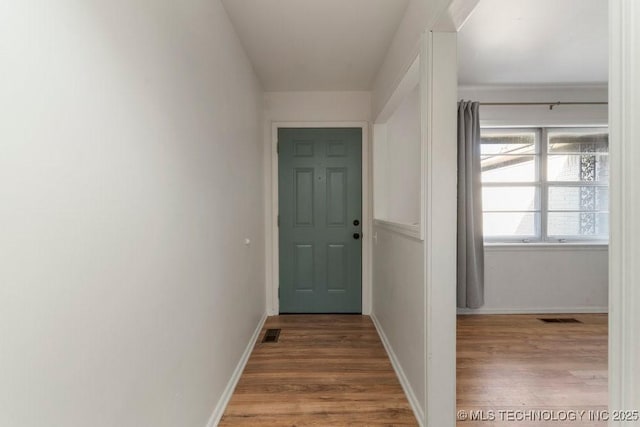 doorway to outside featuring hardwood / wood-style floors