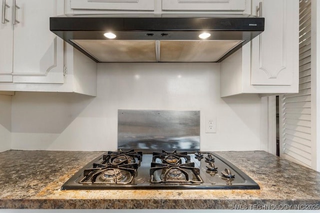 kitchen with white cabinetry and black gas cooktop