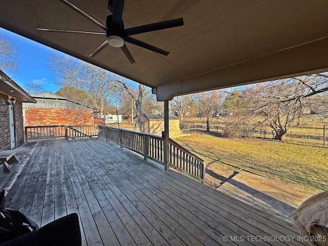 wooden terrace featuring ceiling fan